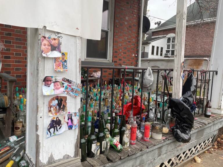 Photos, candles and bottles dominate the shrine for 18-year-old Zion Davis-Shelton, who was gunned down Oct. 24 in the unit block of West 27th Street. Last year Wilmington reeled from a wave of what the mayor called street