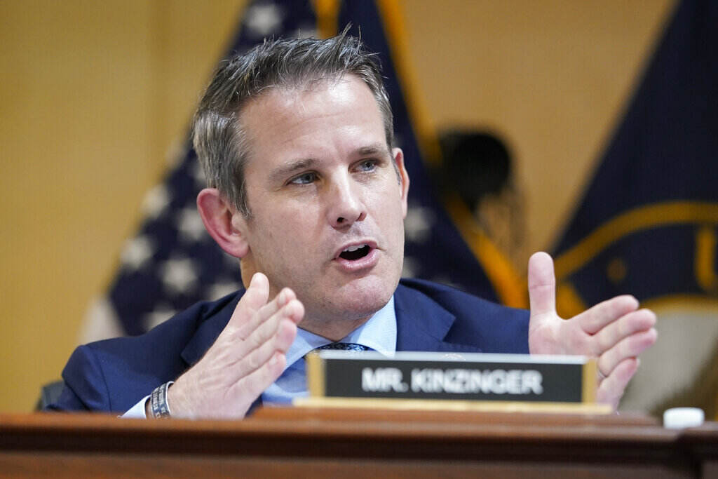 Capitol Riot Investigation Rep. Adam Kinzinger gestures as he speaks at a Jan. 6 investigation hearing.