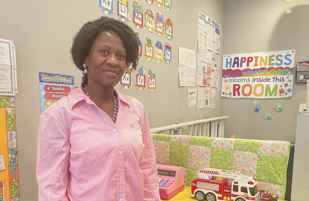 day-care-chalkbeat-01-071822 Adeola Ileyemi poses for a photo inside a day care