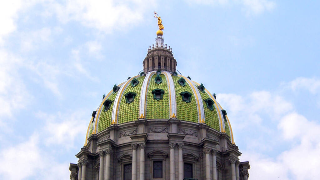 harrisburgstatecapitol The dome of the Pennsylvania State Capitol is visible, in the background a blue sky.