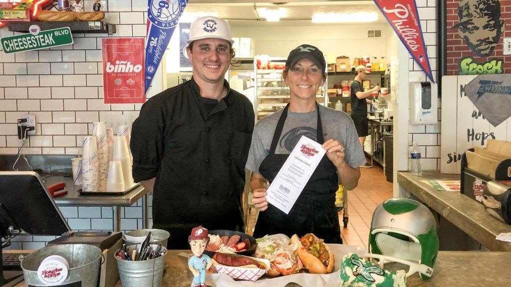 Hoagies & Hops owner Kristina Mazza, a Pottstown native, and general manager Donnie Begley. (Sha Prihar/Billy Penn)