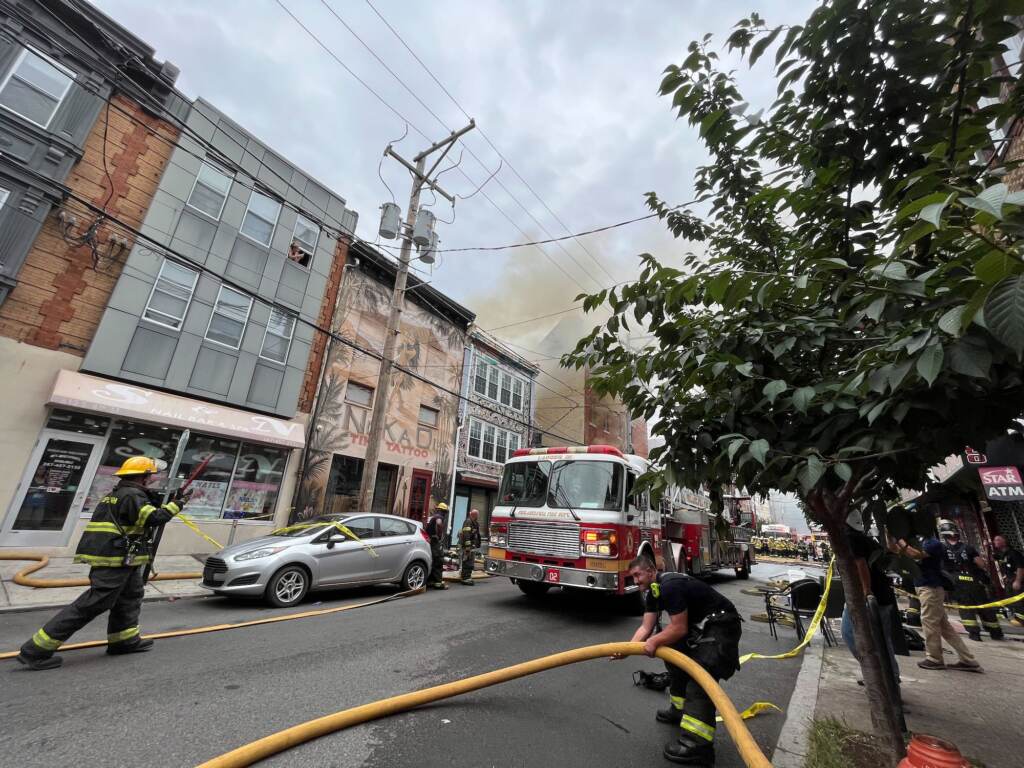 jims-steak-fire-07-29-22 Firefighters putting out a fire that broke out at Jim's Steaks on South St. July 29, 2022.