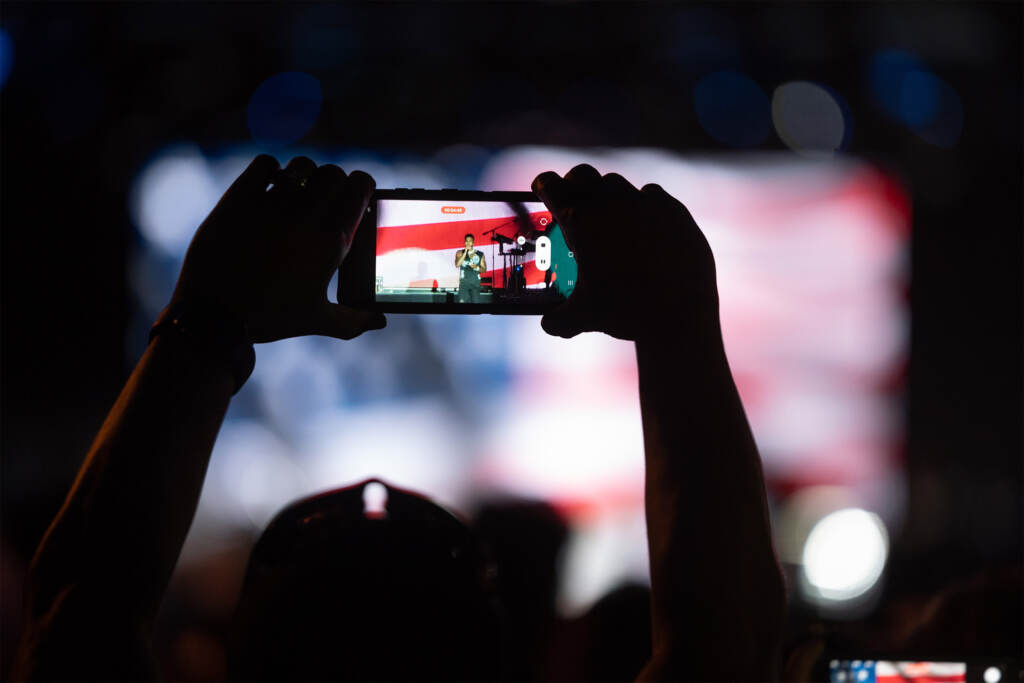 julyfourth2022-parkwayfestival-34 A performer is seen on the phone screen of a spectator of Philly's Wawa Welcome America July 4th concert