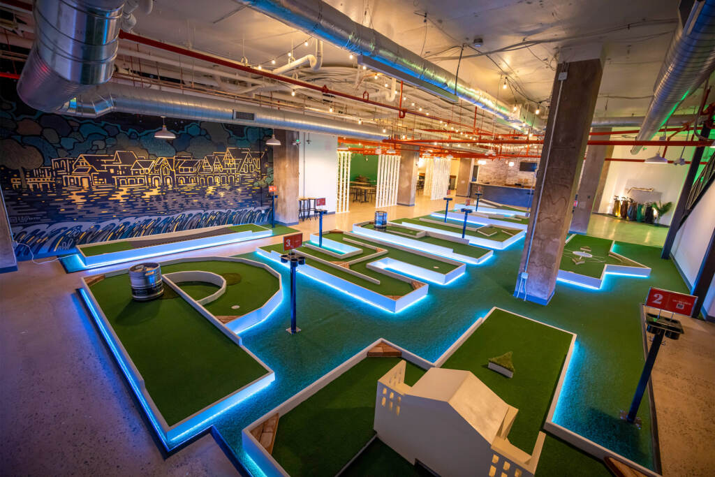 liberteegrounds-minigolf-01 An indoor mini golf course is visible.