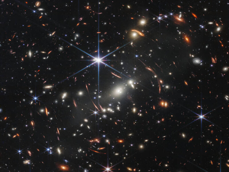 main_image_deep_field_smacs0723-1280-22829458c8466e1bea2669eaaaf13c8d8605d0ad-s800-c85 A cluster of distant galaxies