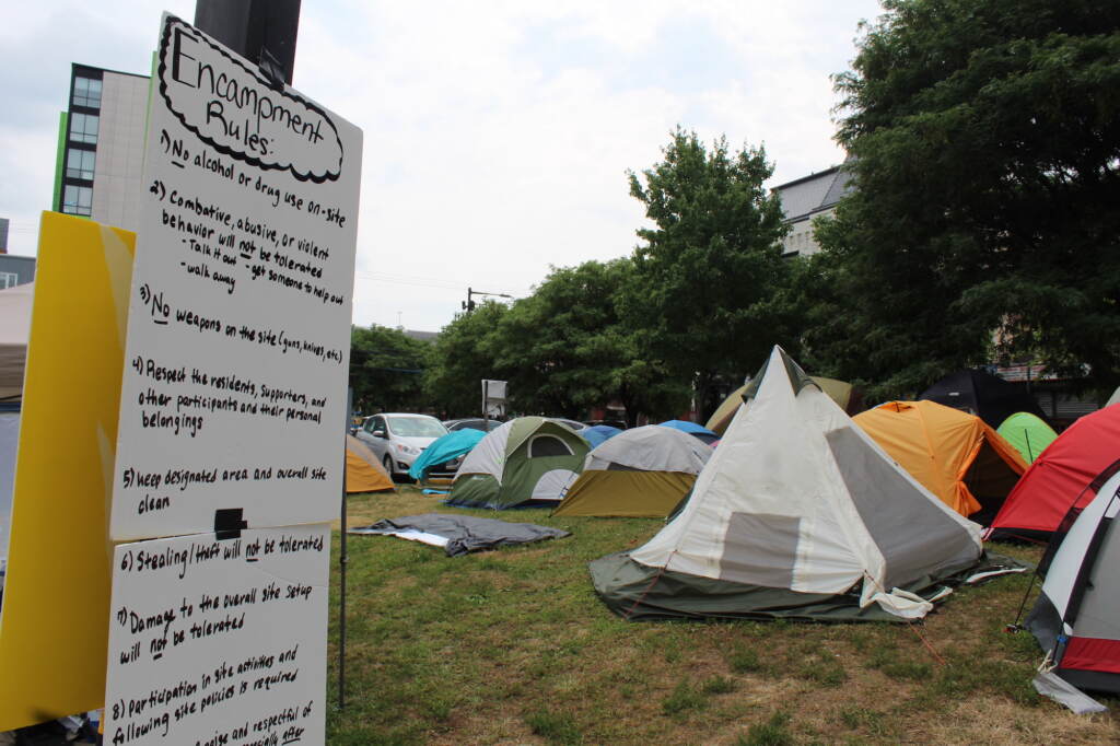 uc-townhomes-encampment-3 A sign that reads