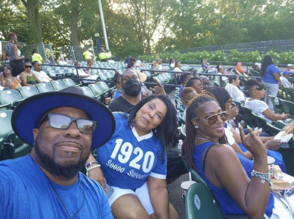 zeta-phi-beta-grand-boule Three people smile for a photo at a re-Grand Boulé event at the Dell Music Center