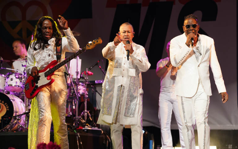 From left, Verdine White, Ralph Johnson and Philip Bailey of Earth, Wind & Fire perform at the Race to Erase MS drive-in event at the Rose Bowl, Friday, June 4, 2021, in Pasadena, Calif. (AP Photo/Chris Pizzello)