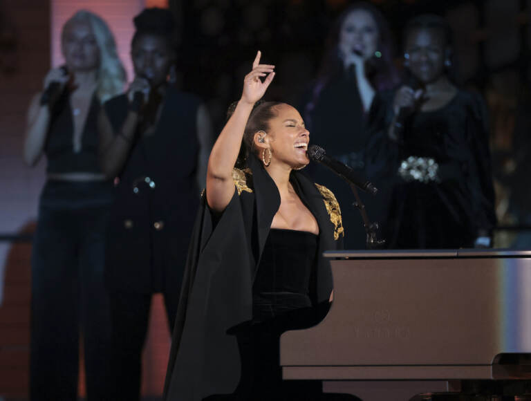 Alicia Keys performs during the Platinum Jubilee concert taking place in front of Buckingham Palace, London, Saturday June 4, 2022, on the third of four days of celebrations to mark the Platinum Jubilee. (Humphrey Nemar/Pool photo via AP)