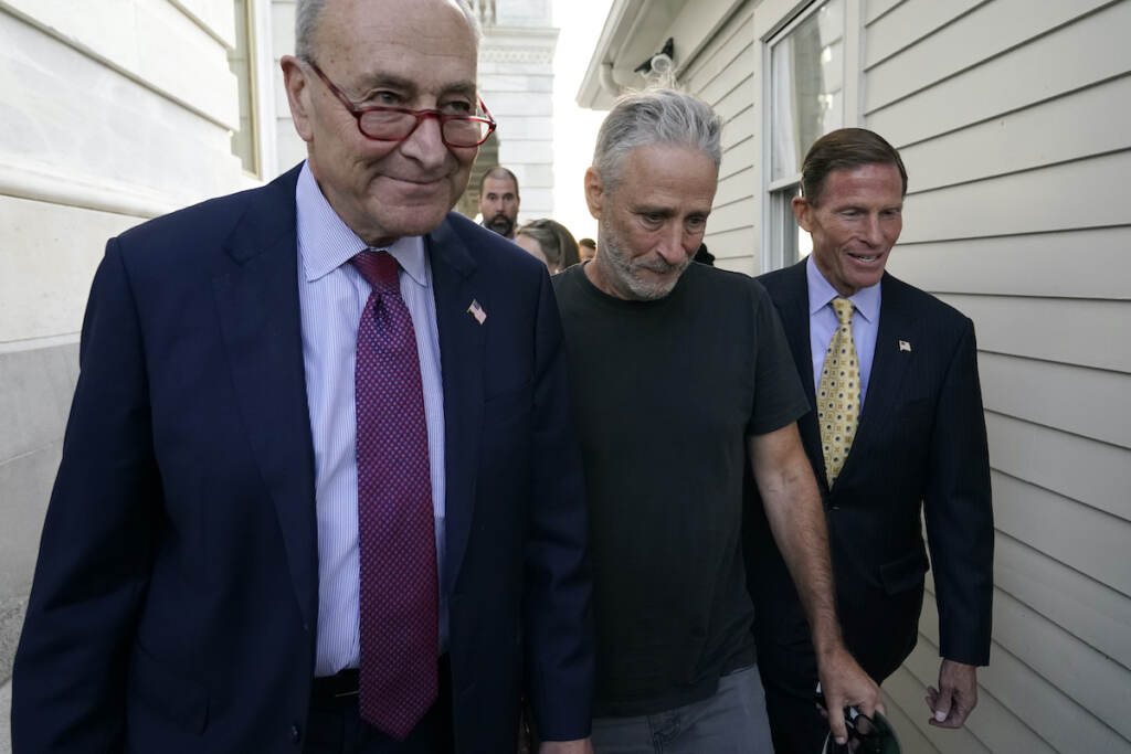 Jon Stewart, Chuck Schumer, Richard Blumenthal Jon Steward (center) walks with Senate Majority Leader Chuck Schumer of N.Y. (left) and Sen. Richard Blumenthal, D-Conn., to a news conference after the Senate passed a bill designed to help millions of veterans exposed to toxic substances during their military service, Tuesday, Aug. 2, 2022, on Capitol Hill in Washington. (AP Photo/Patrick Semansky)