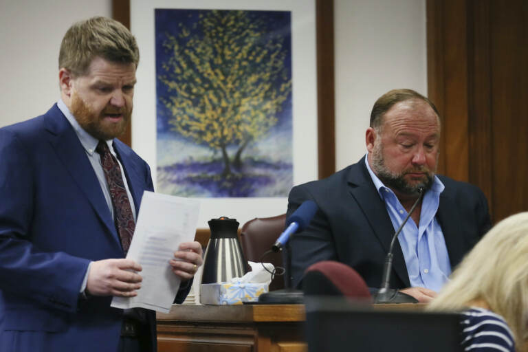 Mark Bankston, lawyer for Neil Heslin and Scarlett Lewis, asks Alex Jones questions about text messages during trial at the Travis County Courthouse in Austin, Wednesday Aug. 3, 2022. (Briana Sanchez/Austin American-Statesman via AP, Pool)
