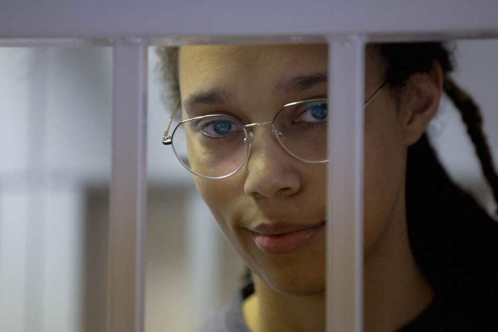 Russia Griner WNBA star and two-time Olympic gold medalist Brittney Griner stands in a cage in a courtroom prior to a hearing in Khimki just outside Moscow, Russia, Thursday, Aug. 4, 2022. Closing arguments in Brittney Griner's cannabis possession case are set for Thursday, nearly six months after the American basketball star was arrested at a Moscow airport in a case that reached the highest levels of US-Russia diplomacy. (Evgenia Novozhenina/Pool Photo via AP)