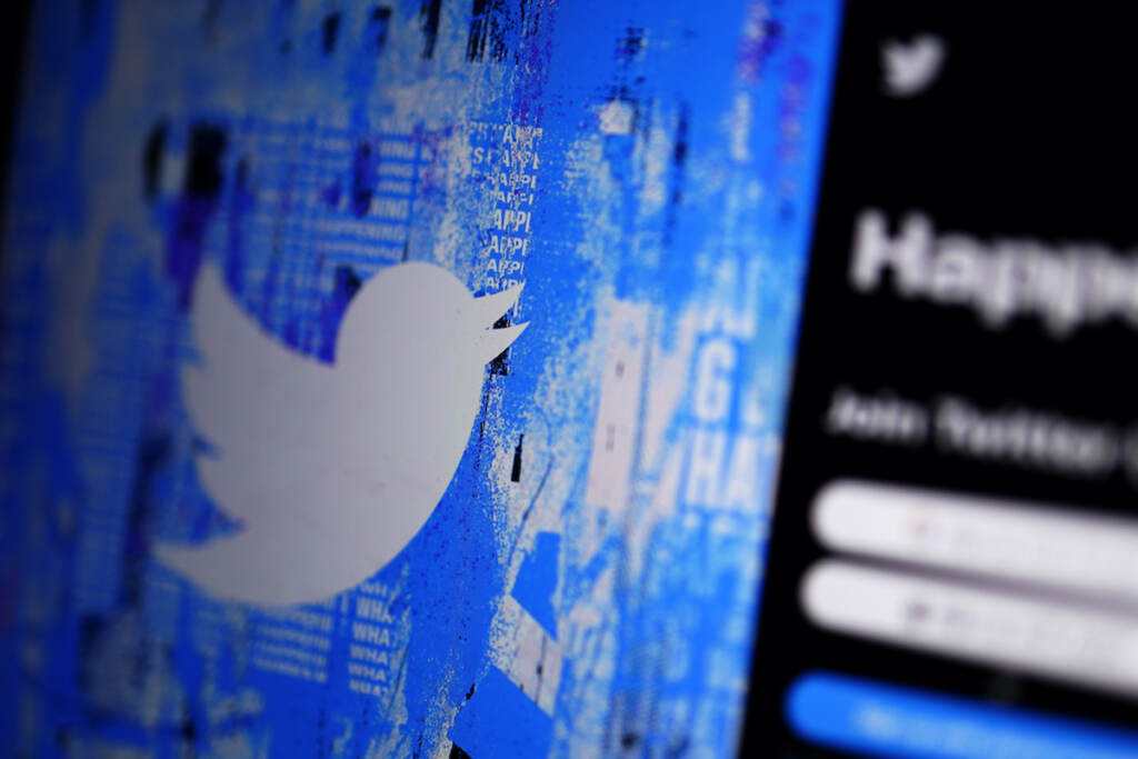 Twitter Musk Lawsuit File photo: The Twitter splash page is displayed on a digital device in San Diego, April 25, 2022. (AP Photo/Gregory Bull, File)