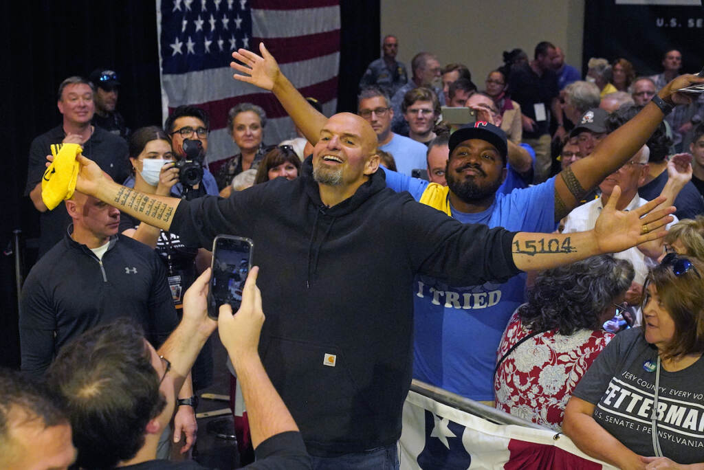 Election 2022 Senate Pennsylvania Pennsylvania Lt. Gov. John Fetterman, the Democratic nominee for the state's U.S. Senate seat, center, poses for a photo with supporters after speaking at a rally in Erie, Pa., on Friday, Aug. 12, 2022. (AP Photo/Gene J. Puskar)