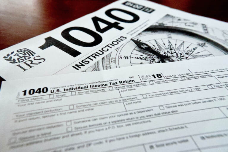 File photo: Internal Revenue Service taxes forms are seen on Feb. 13, 2019. (AP Photo/Keith Srakocic, File)