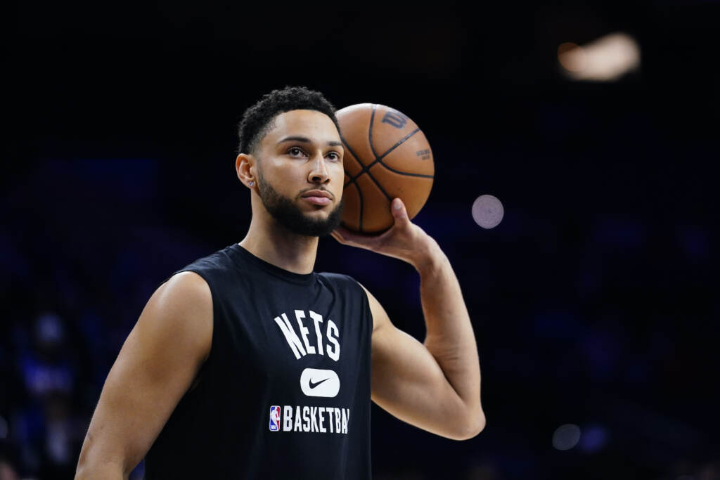 76ers Simmons Basketball FILE - Brooklyn Nets' Ben Simmons watches practice before an NBA basketball game, Thursday, March 10, 2022, in Philadelphia. Simmons and the Philadelphia 76ers have settled the grievance he filed to recoup a portion of last season's salary, a person with knowledge of the details said Monday, Aug. 15, 2022. (AP Photo/Matt Slocum, File)