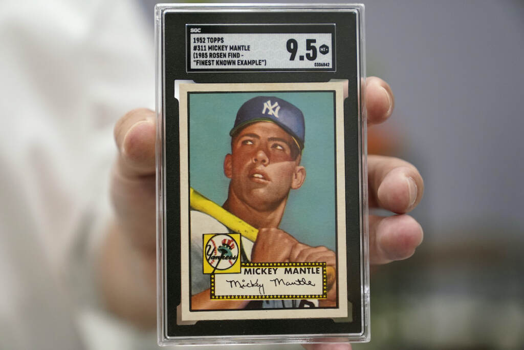 File photo: A Mickey Mantle baseball card is displayed at Heritage Auctions in Dallas, on July 21, 2022. (AP Photo/LM Otero, File)