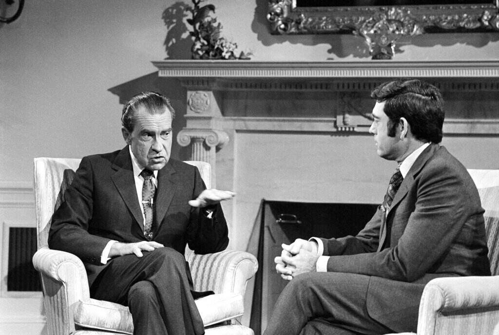 Richard Nixon, Dan Rather President Richard Nixon talks with correspondent Dan Rather before an interview at the White House in Washington, Jan. 2, 1972. (AP Photo/Harvey Georges)
