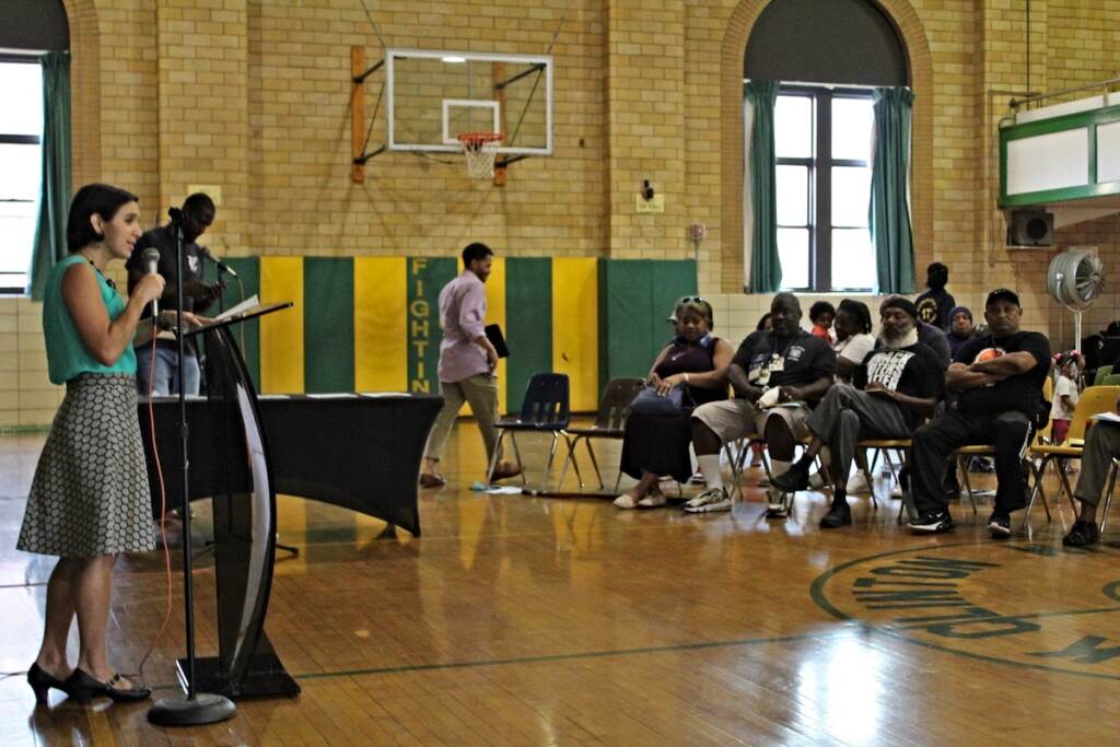 IMG_8239 new Gun violence and prevention reporter Sammy Caiola moderated a community conversation at St. Gabriel's Auditorium in South Philadelphia on Aug. 24, 2022. (Cory Sharber/WHYY)