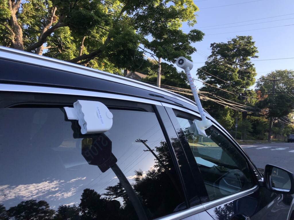 Temperature and air quality sensors attached to Carolyn Martin's car. (Sophia Schmidt/WHYY)