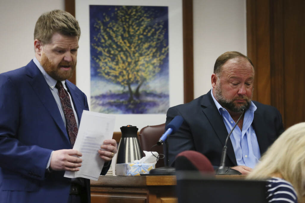 Newtown Shooting-Infowars Mark Bankston, lawyer for Neil Heslin and Scarlett Lewis, asks Alex Jones questions about text messages during trial at the Travis County Courthouse