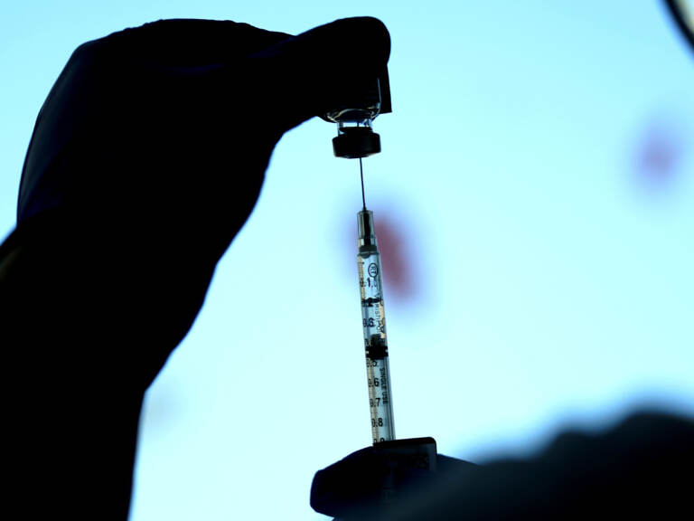 The new booster shot would be an update to Pfizer's current version of the shot, which was designed for the original strain of the coronavirus. (Nam Y. Huh/AP)
