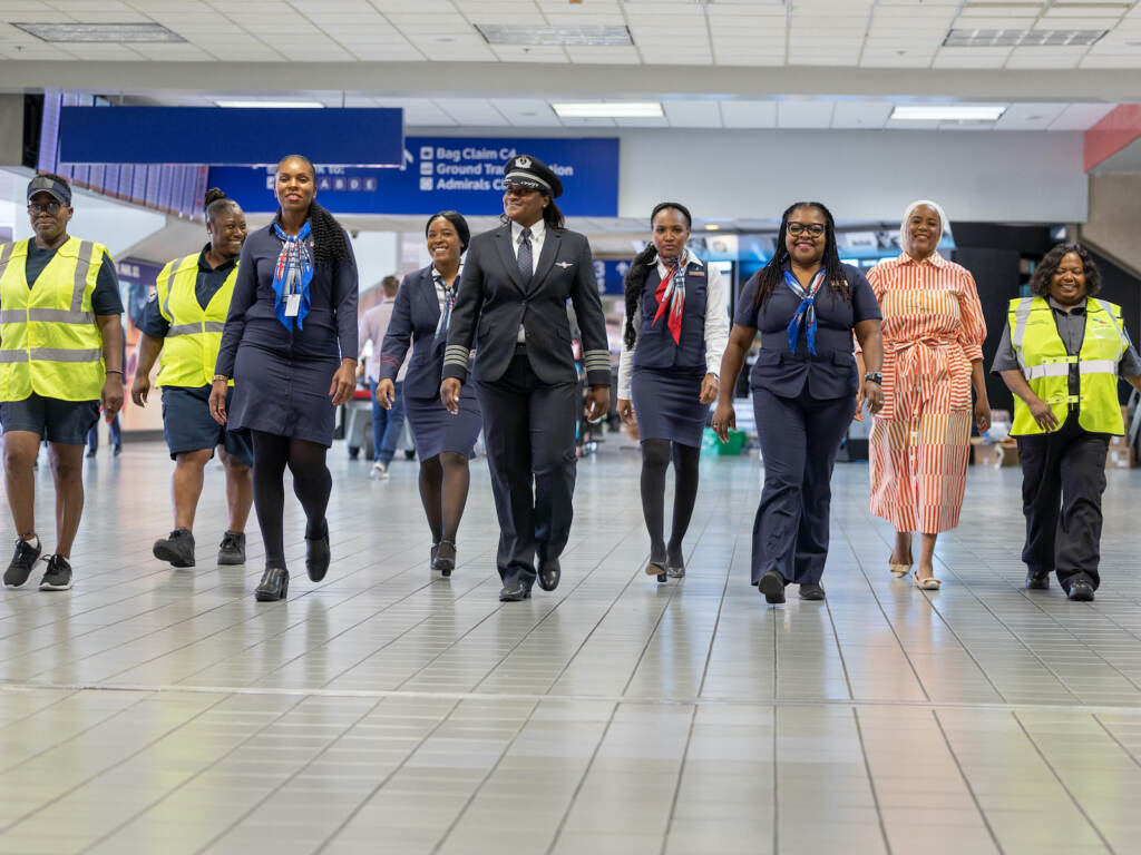 bessie_c_179_original-ca032505aae84d91d8fd35a3720c166cfb8d22b9 A Black, woman-led crew walks at the airport