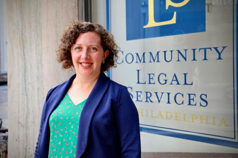 Caitlin Nagel poses for a portrait outside Community Legal Services in Philadelphia
