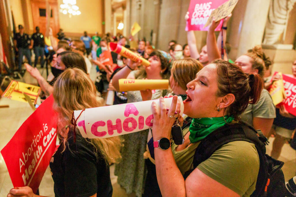 Abortion rights activists chant slogans as the Indiana Senate debates during a special session in Indianapolis before voting to ban abortions. Abortion rights activists chant slogans as the Indiana Senate debates during a special session in Indianapolis before voting to ban abortions. (SOPA Images/LightRocket via Getty Images)