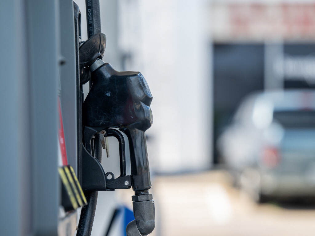 A gas pump is seen at a gas station in Houston on June 9. Gas prices have dropped below $4 a gallon in parts of the country, although the national average remains above that level. (Brandon Bell/Getty Images)