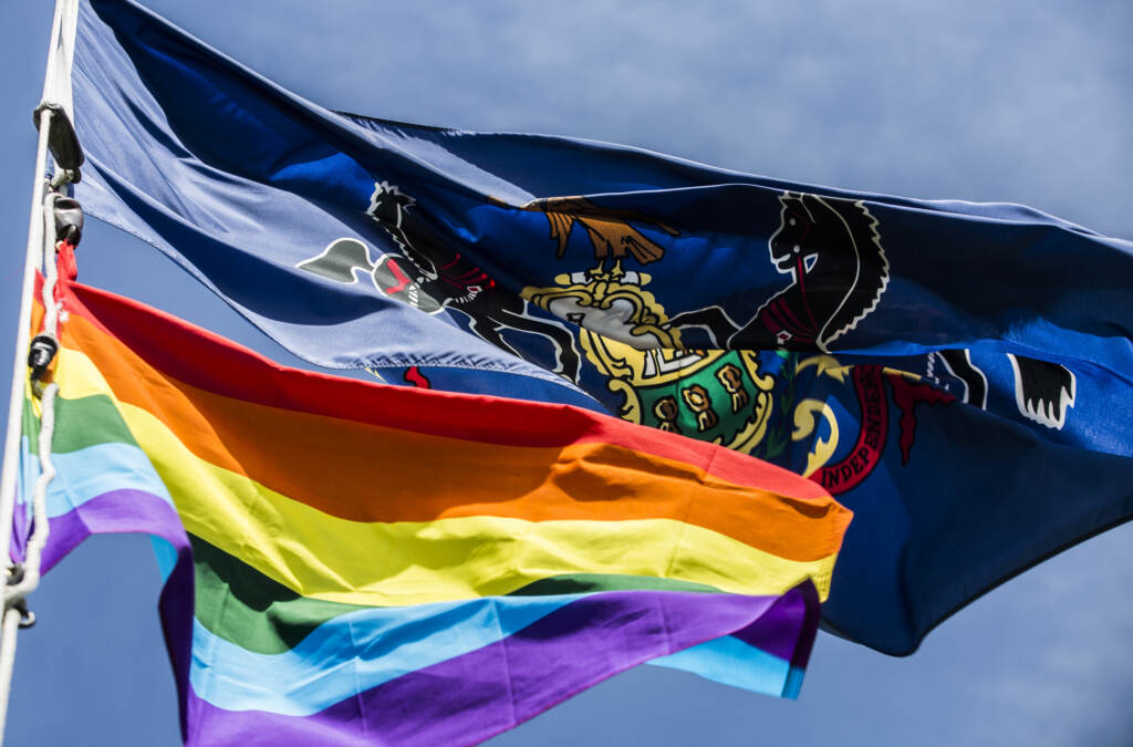 pa-lgbtq-flag-gov-office-081822 The LGBTQ flag flying alongside Pennsylvania's.
