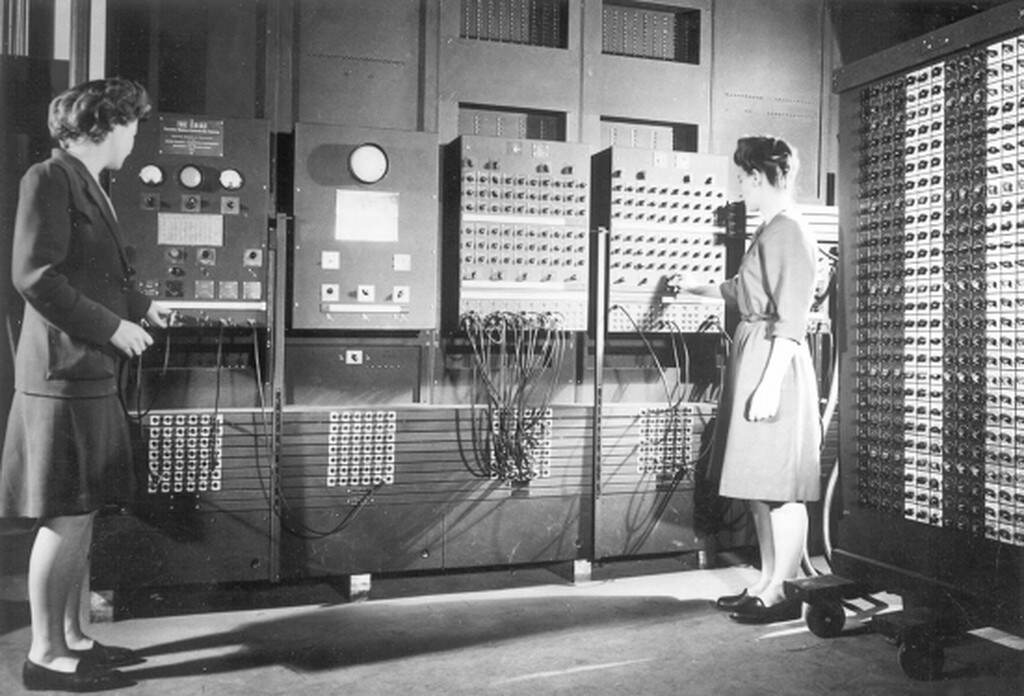 programmers Jean Bartik (left) and Frances Spence operating the ENIAC’s main control panel. (photo credit U.S. Army and University of Pennsylvania)