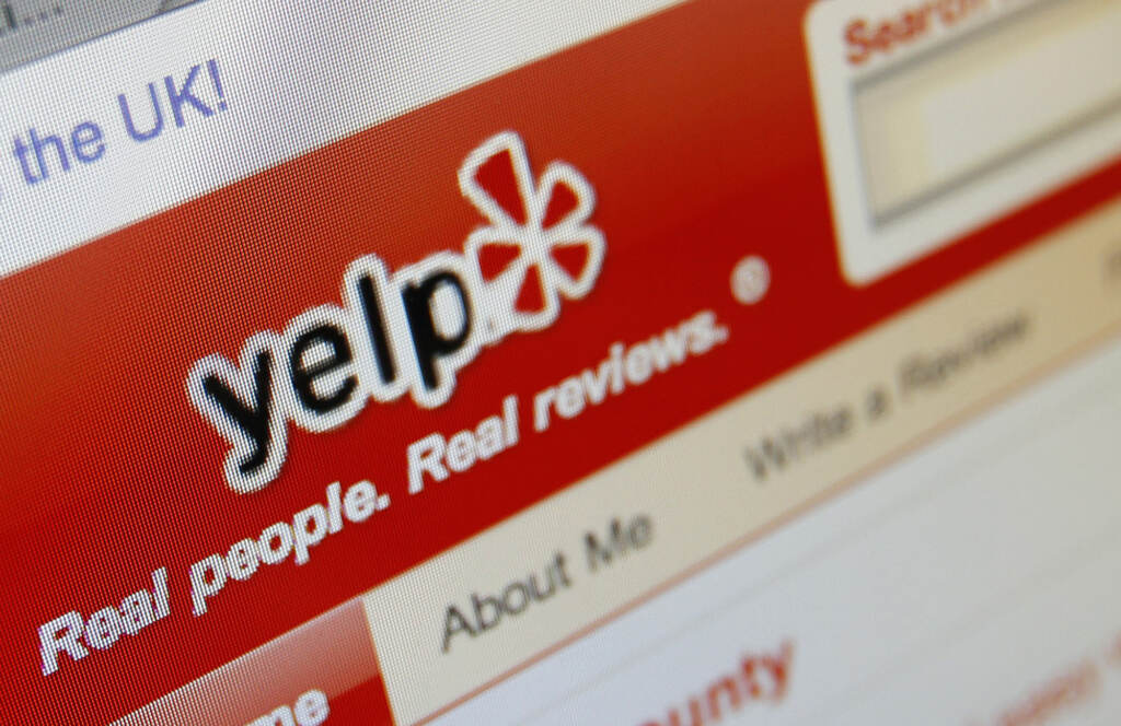Yelp Abortion The Yelp website is shown on a computer screen
