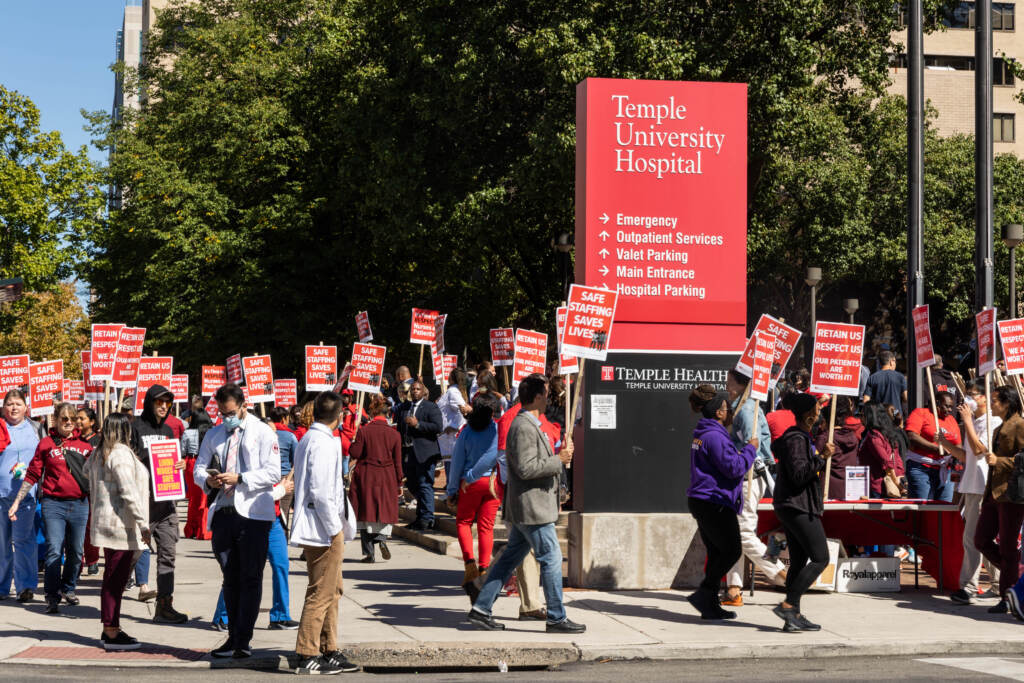 09 23 2022 k paynter nurses picket outside temple university hospital File photo: Nurses at Temple University Hospital in Philadelphia picketed on Broad Street during negotiations of a 3-year contract to raise awareness about issues of recruiting, retention and pay disparity, on Sept. 23, 2022. (Kimberly Paynter/WHYY)