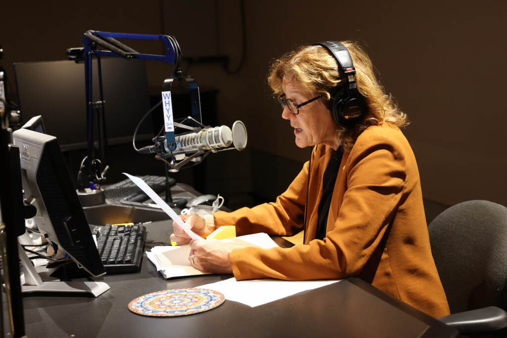 09 29 2022 k paynter marty moss-coane in studio Marty Moss-Coane sits behind the mic at the Radio Times studio
