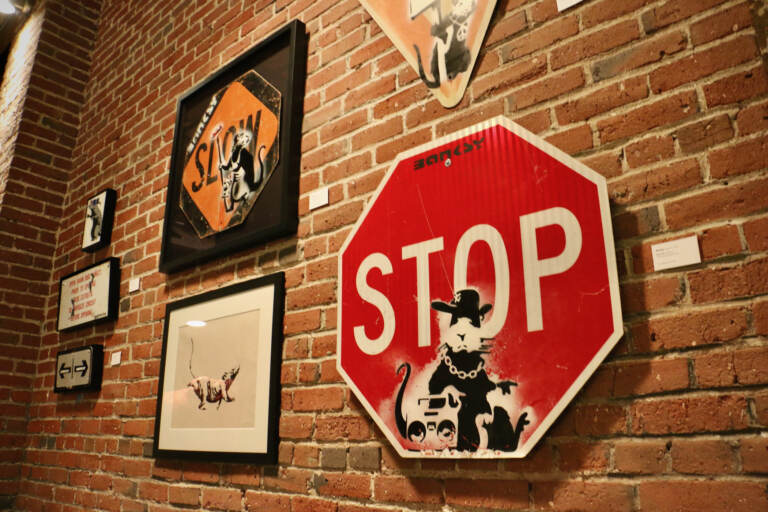 Banksy's rats appeared on street signs in Bristol, England, in the 1990s. (Emma Lee/WHYY)