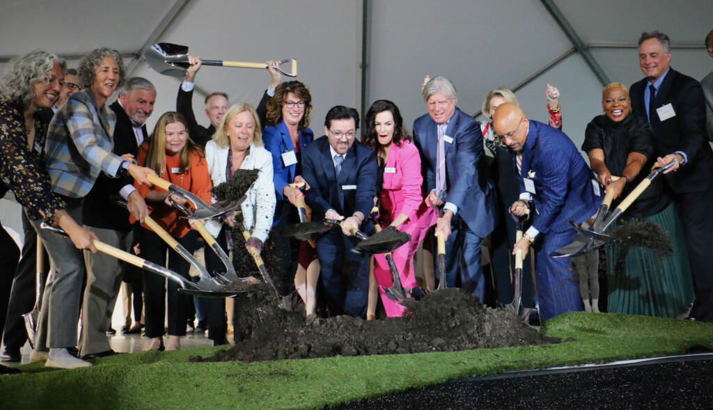 2022 09 29-e lee-philadelphia ballet-groundbreaking shovels Philadelphia Ballet artistic director Angel Corella (center) and executive director Shelly Power (in pink), joined by donors and poltical figures, participate in a ceremonial groundbreaking for the company's new building on North Broad Street. (Emma Lee/WHYY)