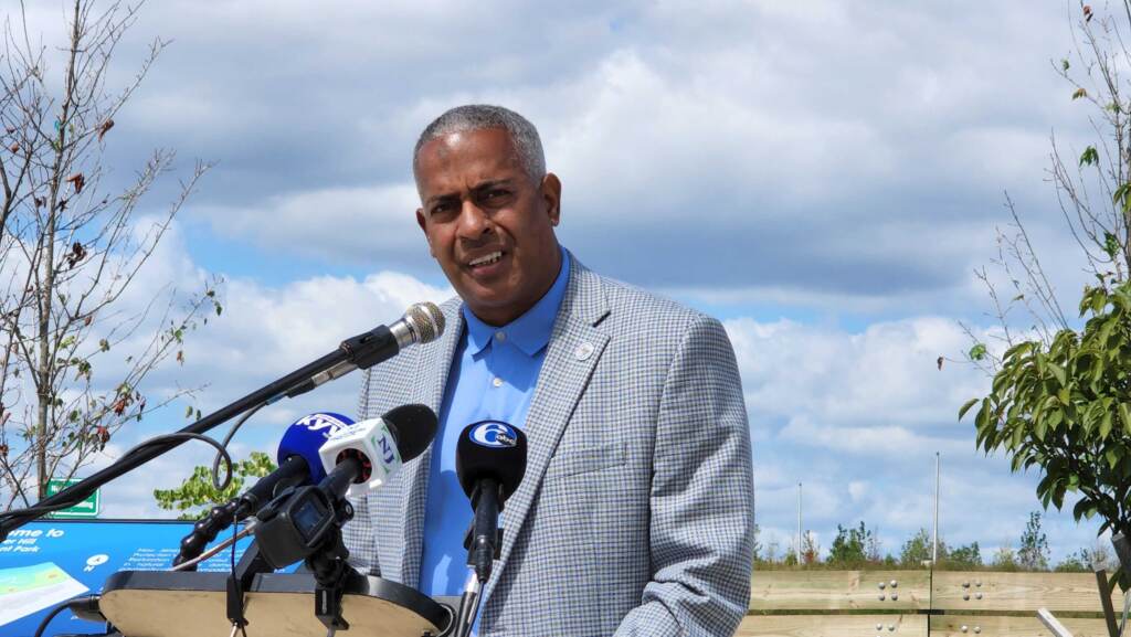 20220908_131644 Camden Mayor Victor Carstarphen speaks at Cramer Hill Waterfront Park. (Tom MacDonald/WHYY)