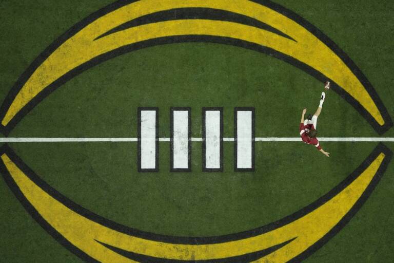 File photo: Alabama's James Burnip warms up before the College Football Playoff championship football game against Georgia on Jan. 10, 2022, in Indianapolis. (AP Photo/Charlie Riedel, File)