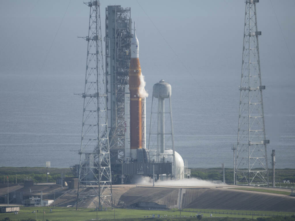 NASA Moon Rocket NASA's new moon rocket sits on Launch Pad 39-B hours ahead of a planned launch at the Kennedy Space Center Saturday, Sept. 3, 2022, in Cape Canaveral, Fla. (Joel Kowsky/NASA via AP)