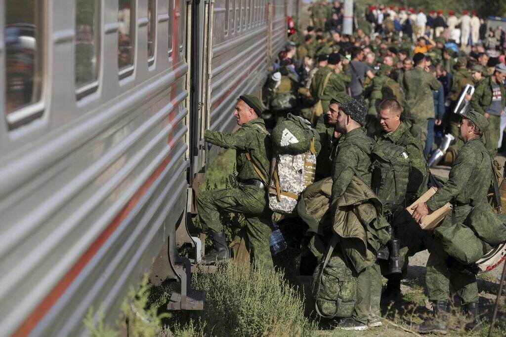 Russia Ukraine Russian recruits take a train at a railway station in Prudboi, Volgograd region of Russia, Thursday, Sept. 29, 2022. Russian President Vladimir Putin has ordered a partial mobilization of reservists to beef up his forces in Ukraine. (AP Photo)