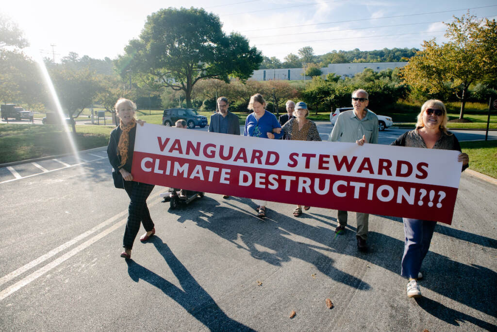 File photo: Climate activists with the Earth Quaker Action Team protest Vanguard's fossil fuel investments at their headquarters in Malvern. Eight people who sought to meet with an executive were arrested after refusing to leave and charged with misdemeanor defiant trespass. (Courtesy of Earth Quaker Action Team)