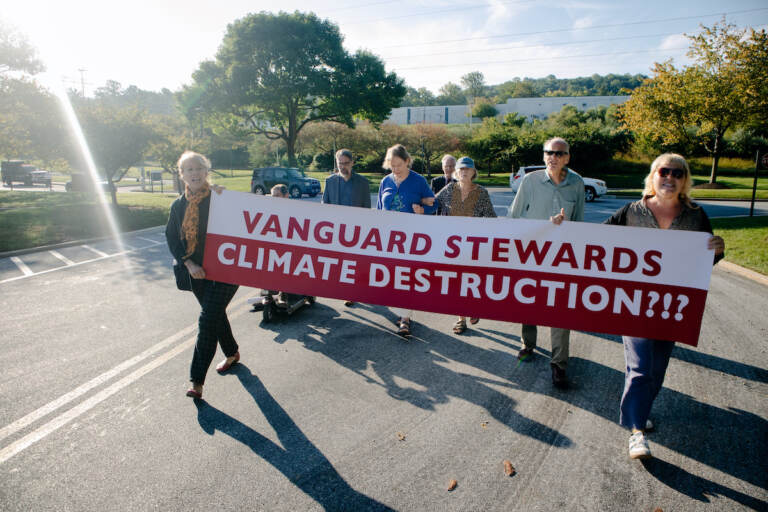 File photo: Climate activists with the Earth Quaker Action Team protest Vanguard's fossil fuel investments at their headquarters in Malvern. Eight people who sought to meet with an executive were arrested after refusing to leave and charged with misdemeanor defiant trespass. (Courtesy of Earth Quaker Action Team)