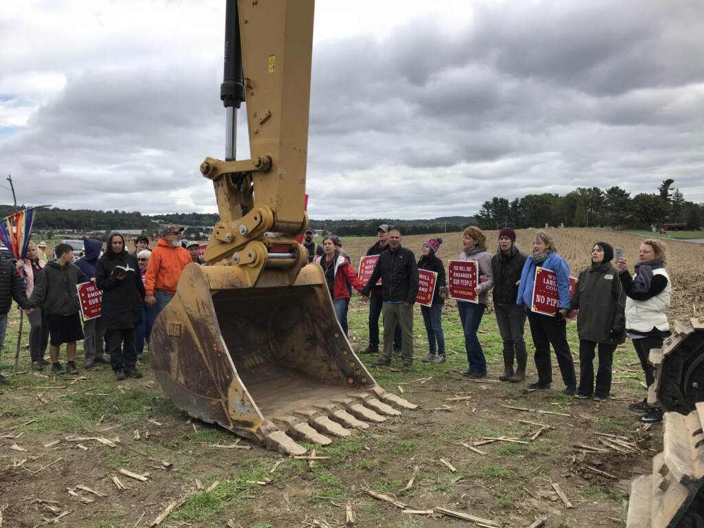 Protesters confront a construction crew for the Atlantic Sunrise pipeline in central Pennsylvania. (Marie Cusick / StateImpact Pennsylvania)