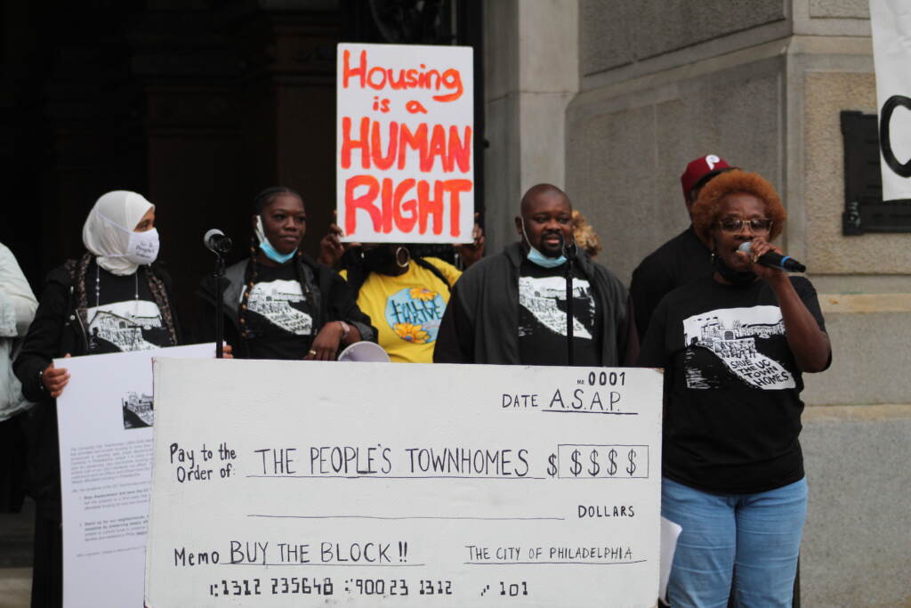 IMG_8855 Residents have been protesting the potential sale of UC Townhomes for months since property owners announced last July that the HUD contract wouldn't be renewed. (Cory Sharber/WHYY)