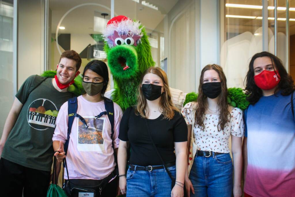 Students pose with the Phillie Phanatic 2021's CollegeFest, Campus Philly’s annual Welcome to Philly celebration. (Karan Sethiya for Campus Philly)
