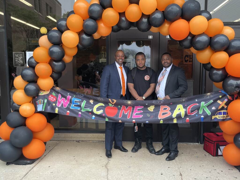 Superintendent Craig Parkinson (L) and Receiver Nafis Nichols (R) welcome back Chester Upland students in August 29, 2022 bell-ringing ceremony. (Courtesy of AEssential Consulting)