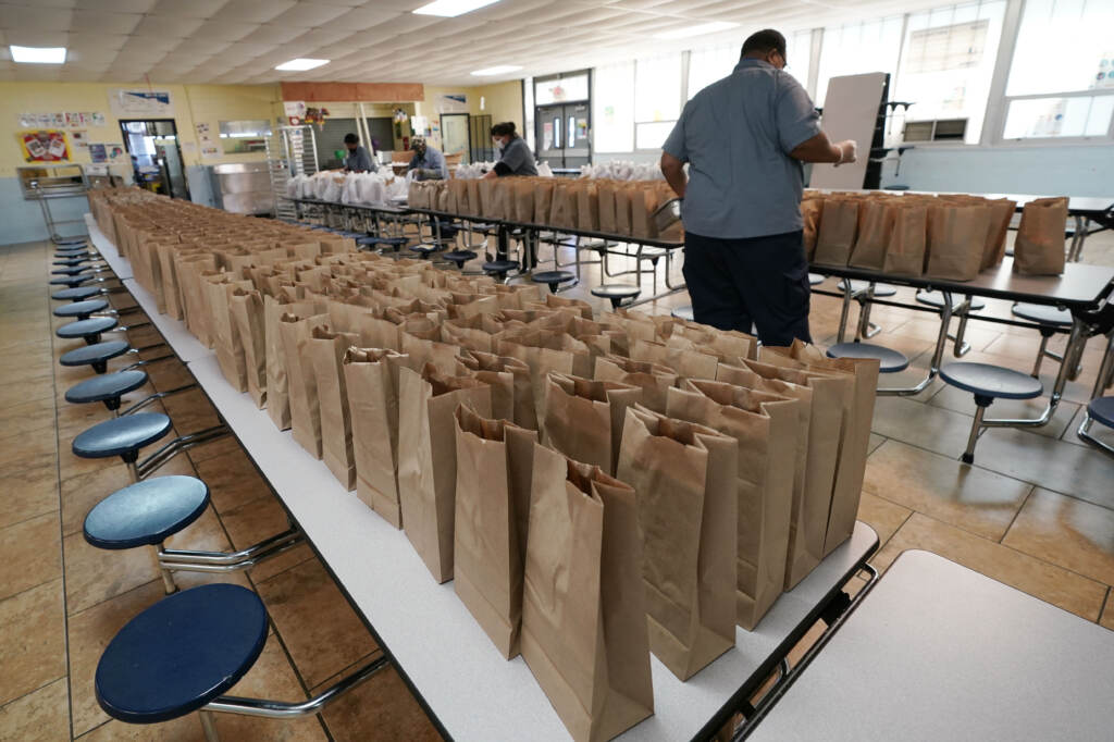 Jefferson County School District Food Service Department staff arrange some of the hundreds of free lunches that was given to students on March 3, 2021 in Fayette, Miss. As one of the most food insecure counties in the United States, many families and their children come to depend on the free meals as their only means of daily sustenance. Jefferson County School District Food Service Department staff arrange some of the hundreds of free lunches that was given to students on March 3, 2021 in Fayette, Miss. As one of the most food insecure counties in the United States, many families and their children come to depend on the free meals as their only means of daily sustenance. (Rogelio V. Solis/AP