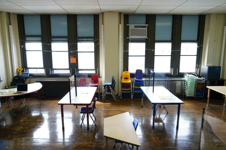 Desks are spaced apart at an elementary school