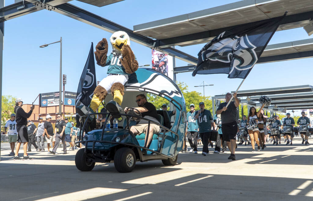eaglestailgate-2021niners-07 The Eagles mascot is seen on the front of a parade vehicle shaped like an Eagles helmet